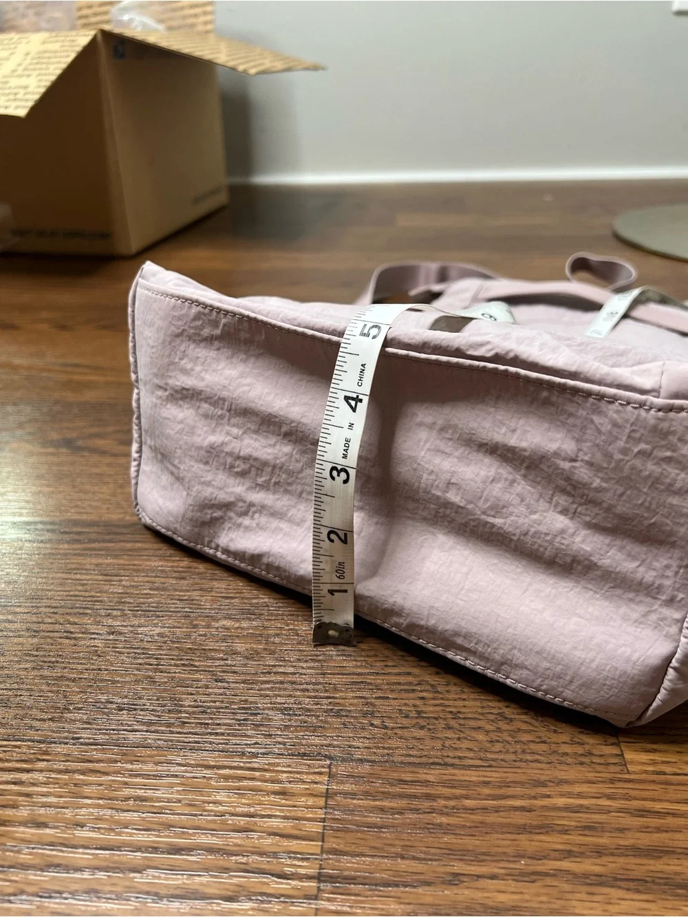 Lululemon On My Level Crossbody Bag in a light purple shade